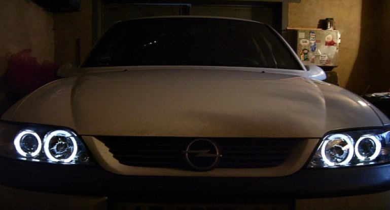 Замена лампы ближнего света Opel Astra H, G, J и Vectra A, B: тюнинг и регулировка фар, реснички